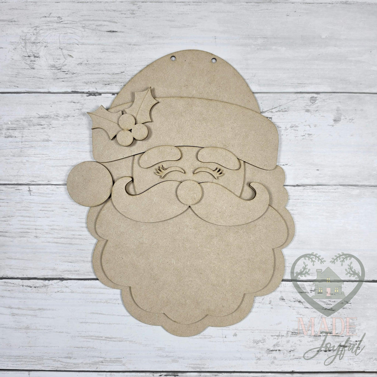 Unfinished laser-cut wood Retro Santa Face Door Hanger DIY kit (Santa face pieces), ready to paint at a DIY party in Williamson County, TN.