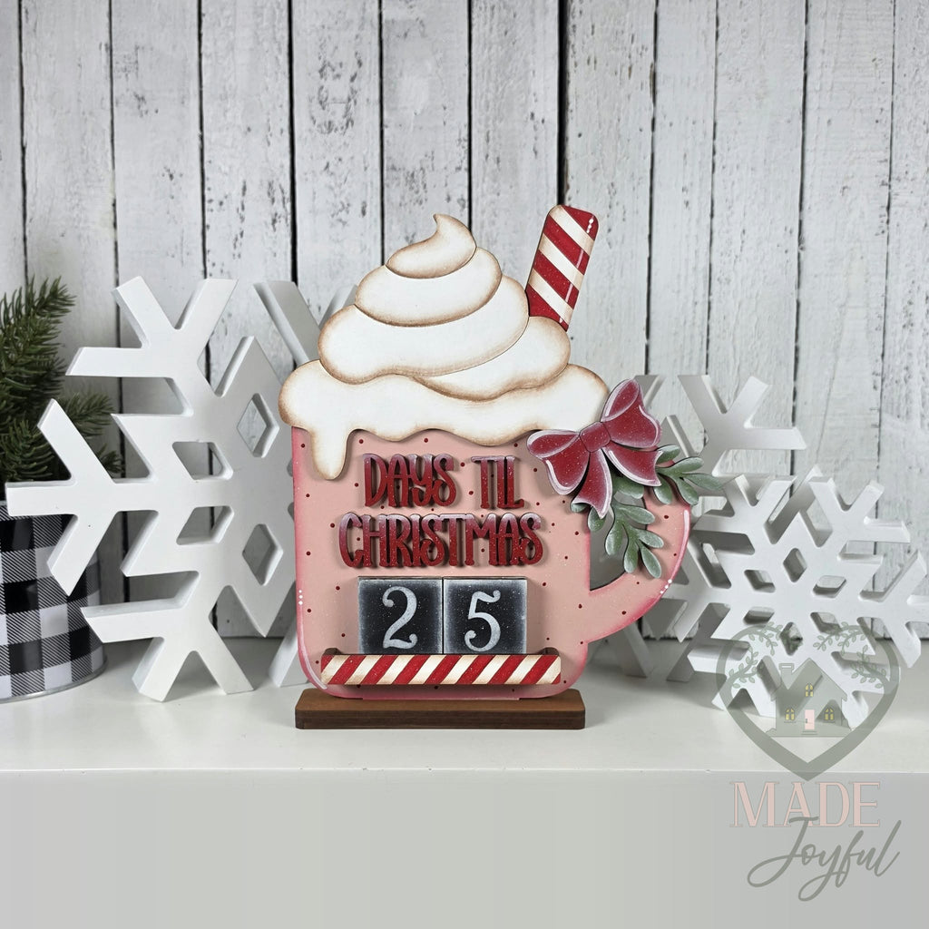 Pink hot cocoa Christmas countdown mug with Days til Christmas and number blocks showing 25, hand-painted in Brentwood, TN.