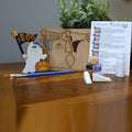 Kids DIY paint kit: ghost with BOO flag and jack-o'-lantern, with wood pieces, paints, brushes, sponges, glue and instructions. A favorite at kids' DIY parties in Williamson County, TN