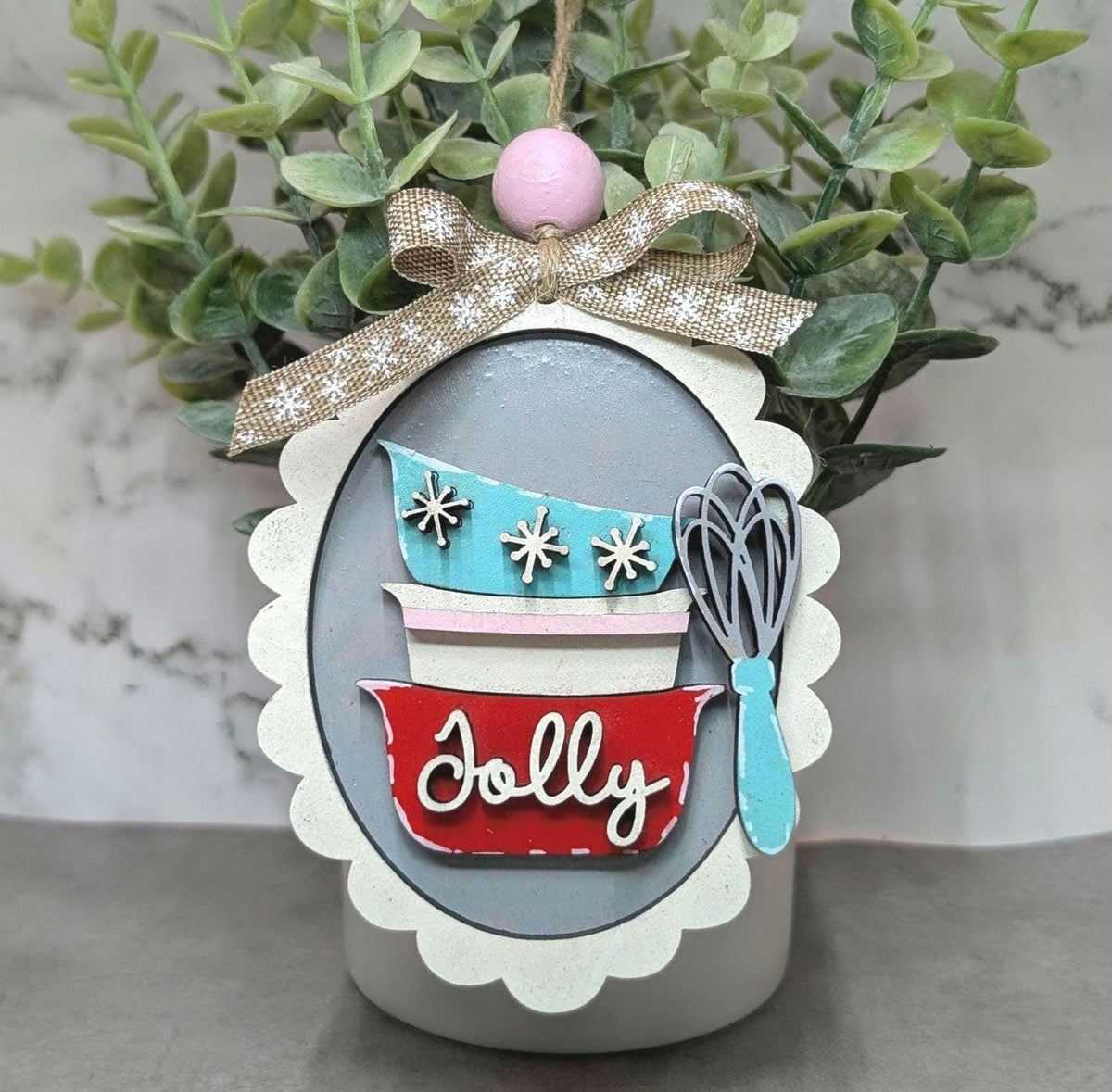 Hand-painted retro Christmas baking ornaments with a stand mixer, mixing bowls, utensils, gingerbread and Cookie Crew designs, hand-painted in Brentwood, TN.