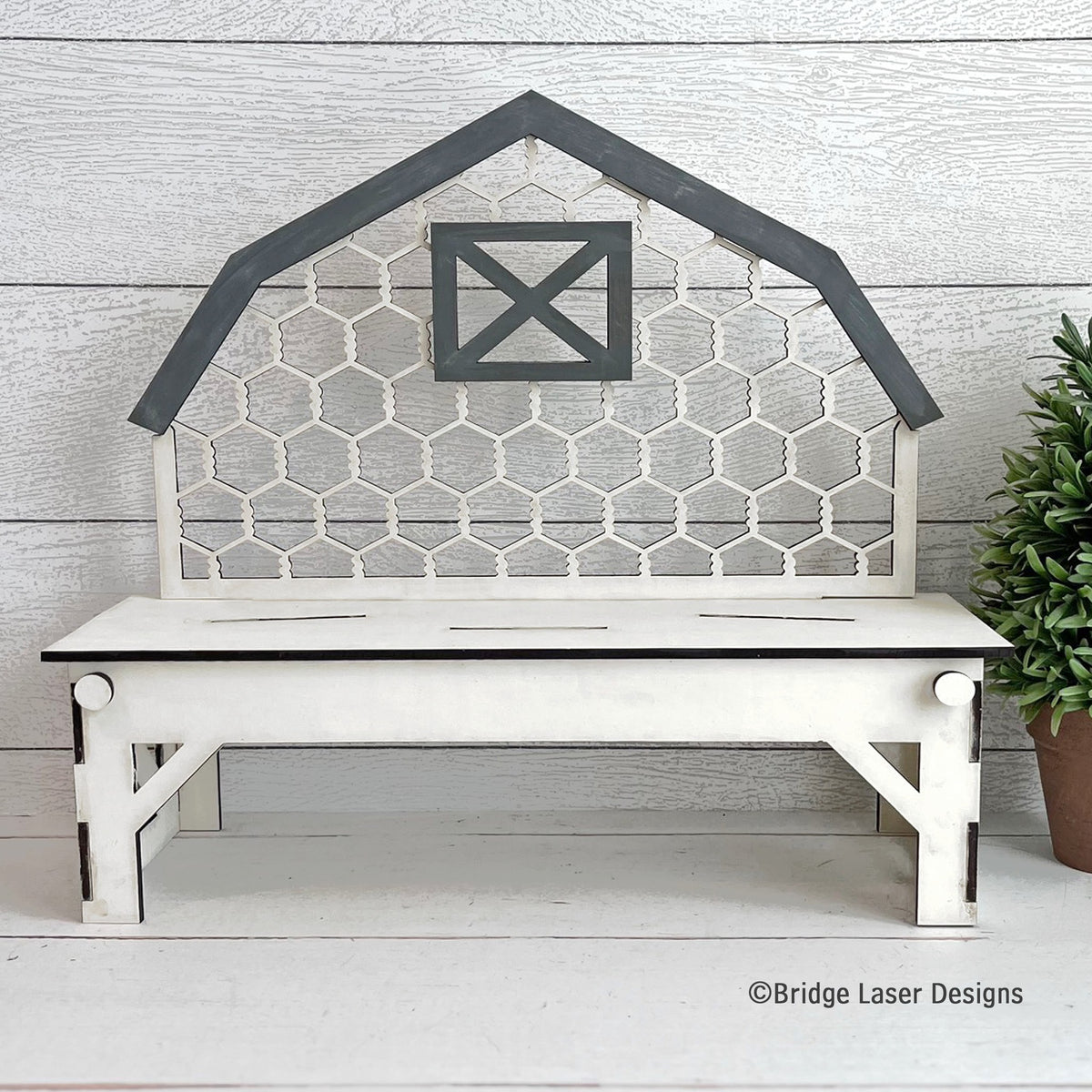 Barn-shaped interchangeable wood bench with a chicken wire back, available with this decor set